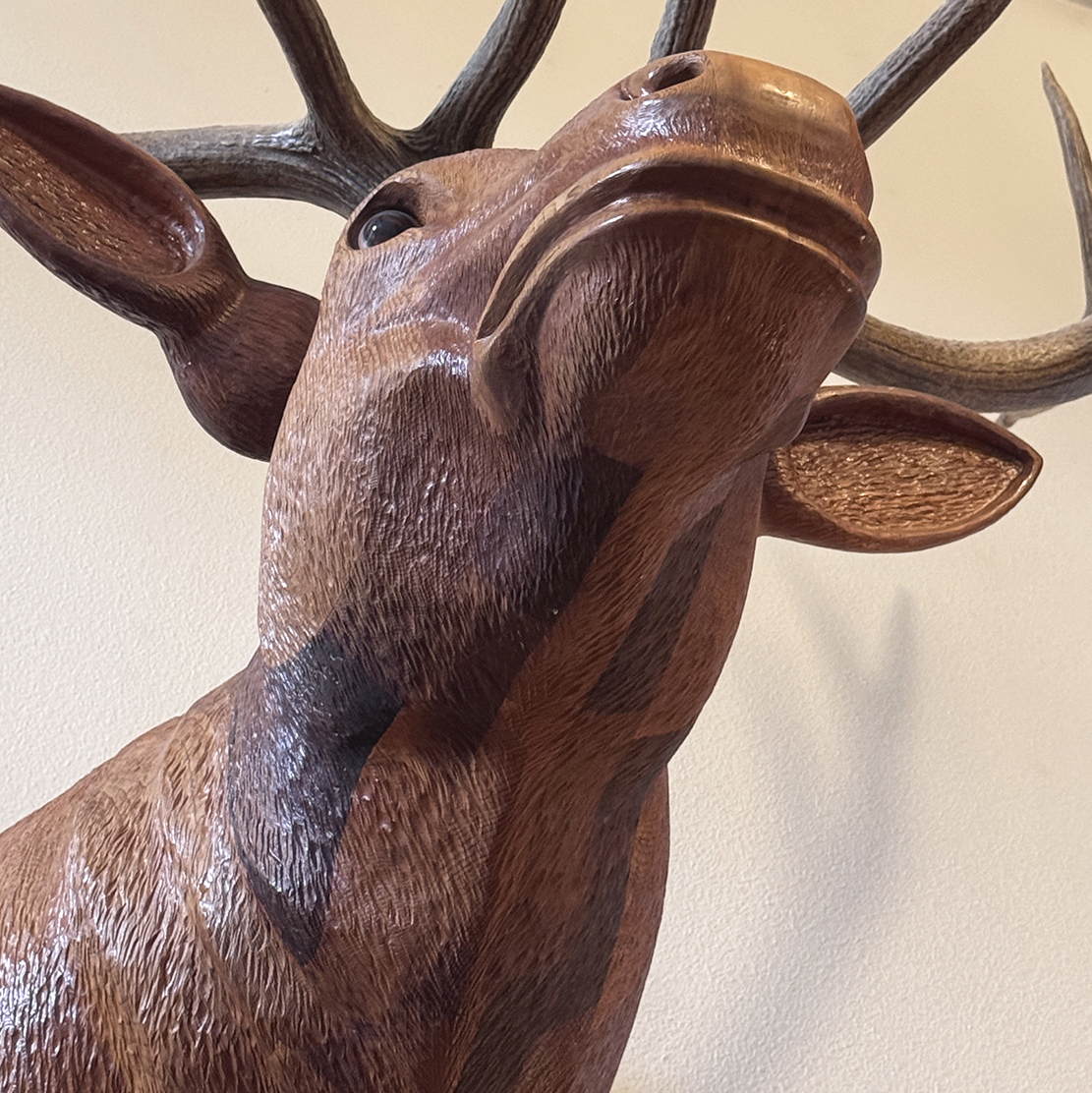 Close up of elk carving